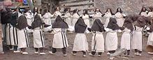 Women dancing in the fair
